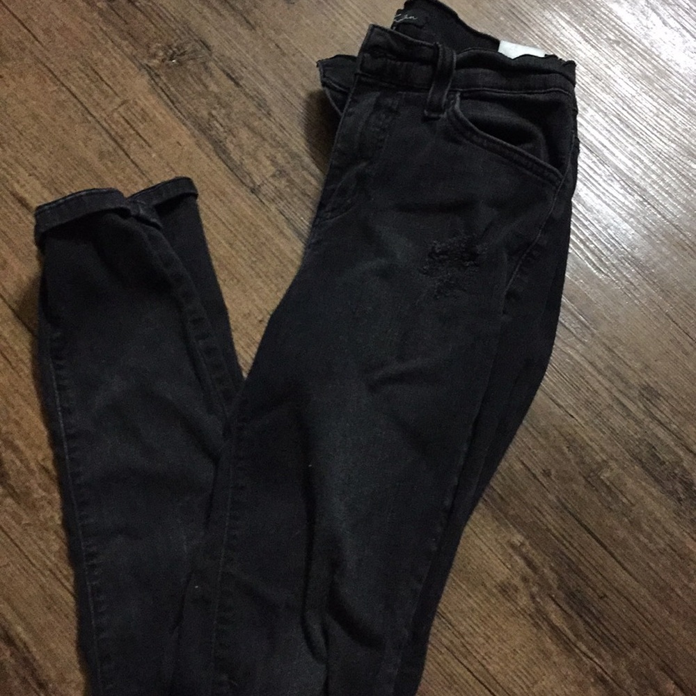 Distressed black jeans